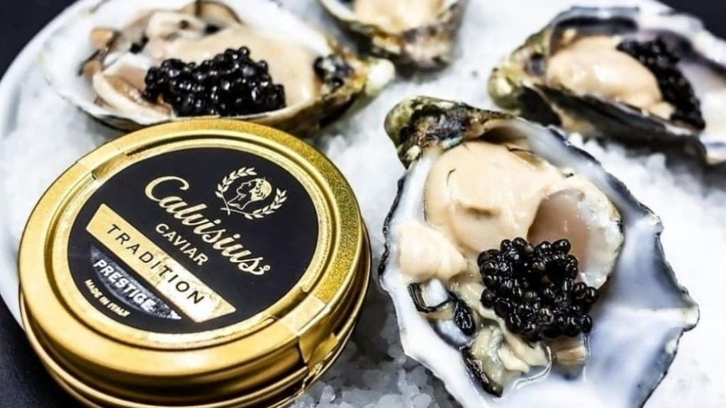 Oysters and caviar at Ostrería & Sushi in Triana Market